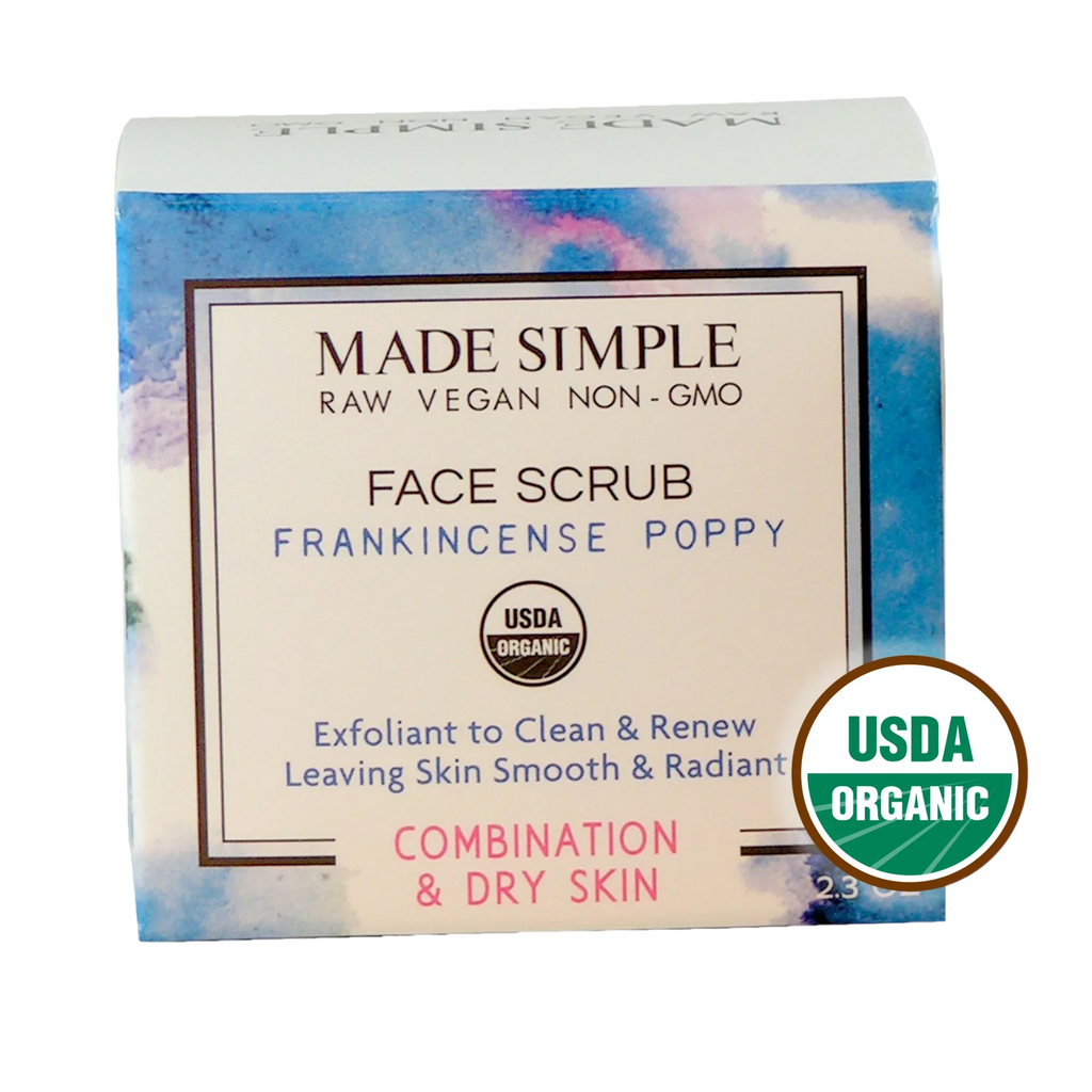 Face scrub packaging labeled frankincense poppy, USDA organic, for combination and dry skin