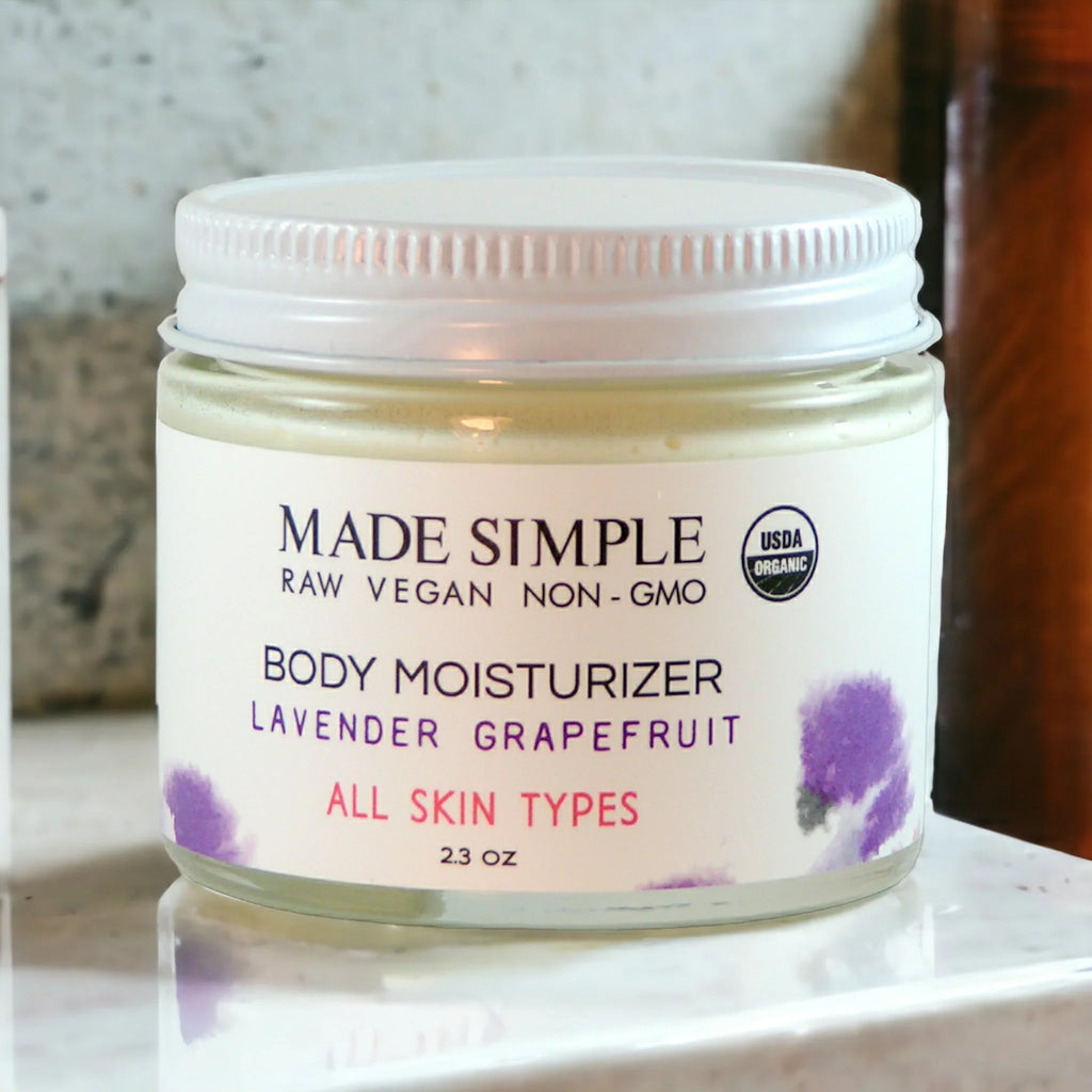 Organic lavender grapefruit body moisturizer jar for all skin types on marble counter