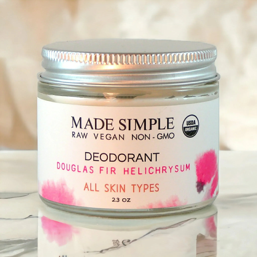 Organic vegan Douglas Fir Helichrysum deodorant jar for all skin types on marble