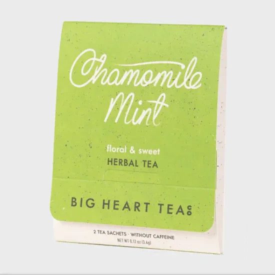 Chamomile Mint herbal tea sachets in eco-friendly green packaging, labeled floral and sweet.